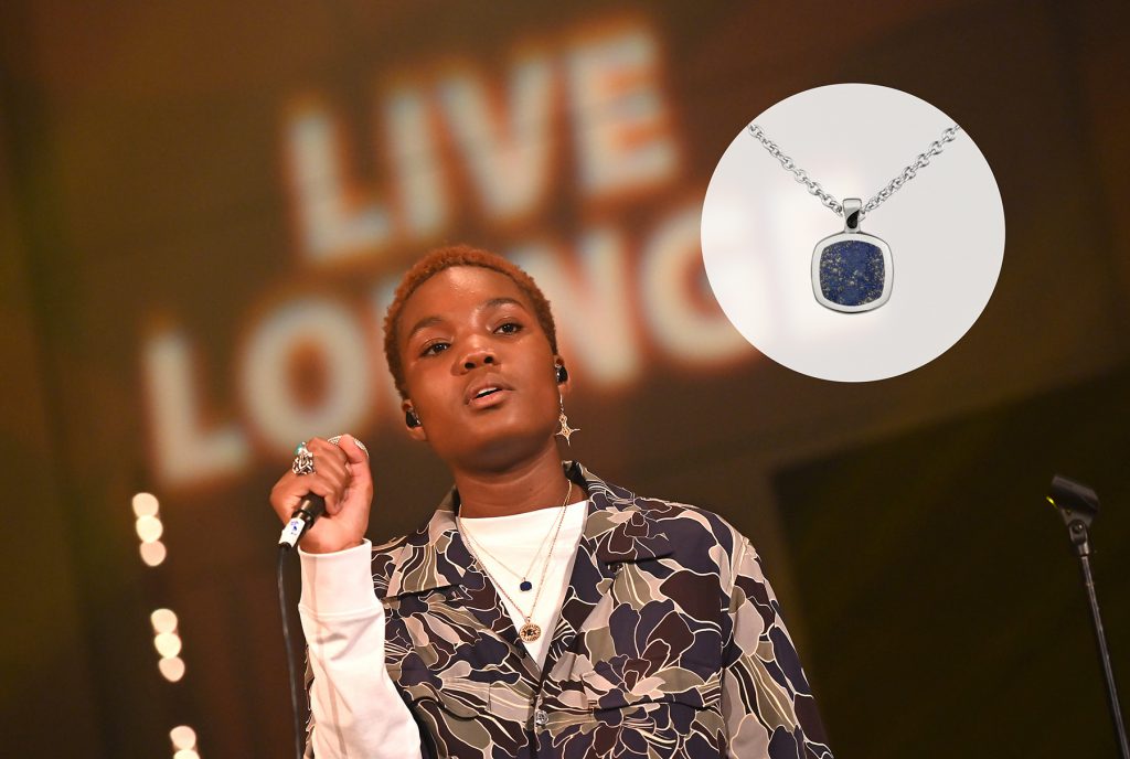 Arlo Parks singing at the BBC Radio 1 Live Lounge, inset with our silver signet necklace with a blue inlay
