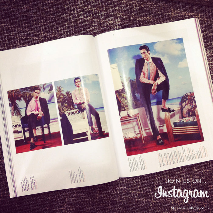 Arena Homme+ magazine open on a men's fashion shoot of a model in a suit, with a Join us on Instagram caption