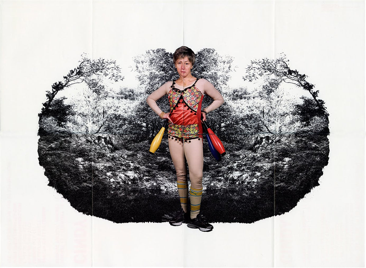 Photographic artwork of a woman in a circus costume holding juggling clubs against a mirrored forest backdrop