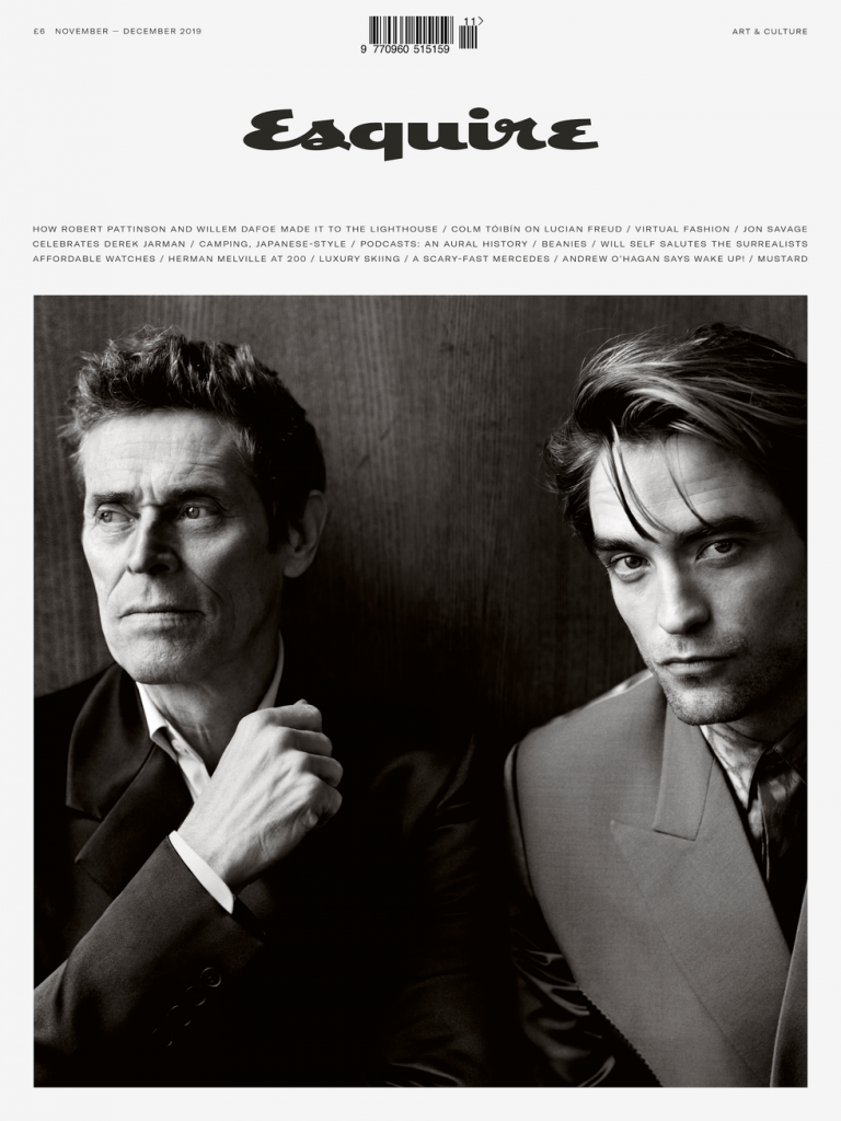 Esquire cover, black and white portrait of Robert Pattinson in a suit beside an older man in a dark jacket