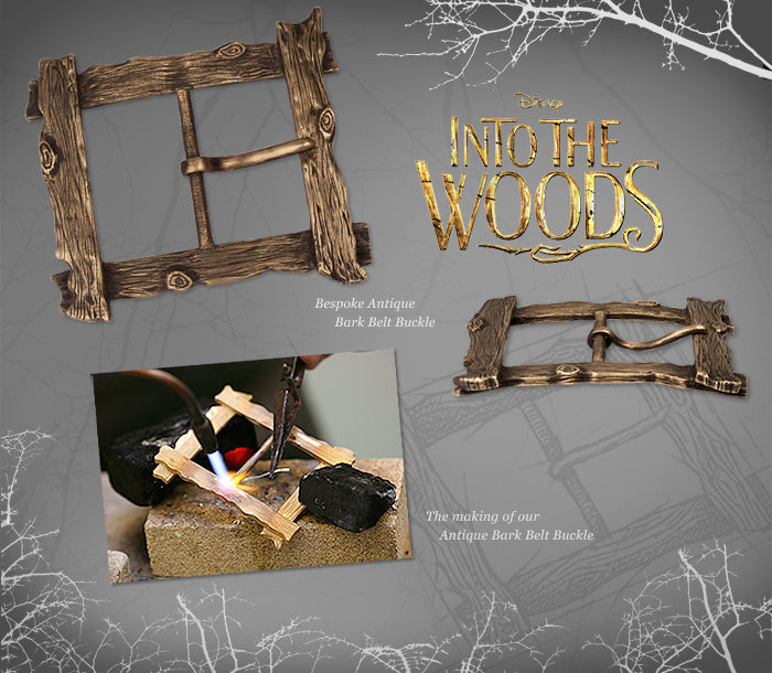 Bespoke bronze belt buckle cast to look like tree bark, made for Into the Woods, and being soldered at the bench