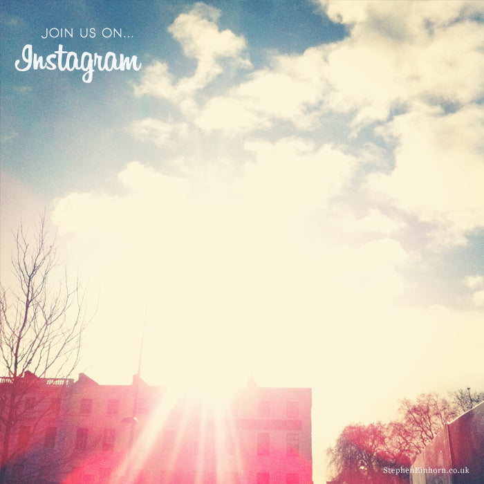 Winter sun flaring over a London terrace and bare trees, with the words Join us on Instagram
