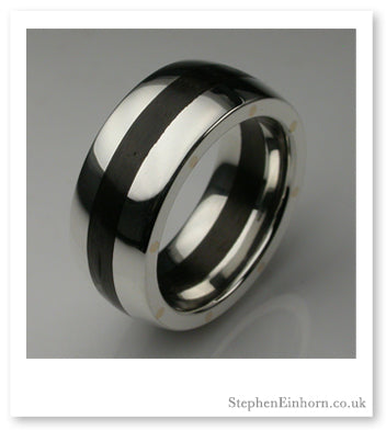 Wide polished silver Geo Elipse ring with a dark wood inlay running around the centre of the band