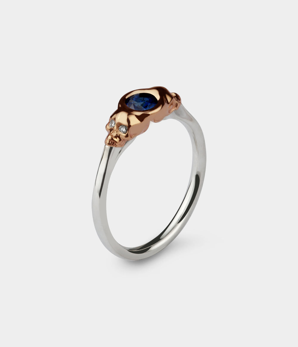 Beloved Skull Ring Two Tone in 9ct Rose Gold & Silver with Blue Sapphire, Size P