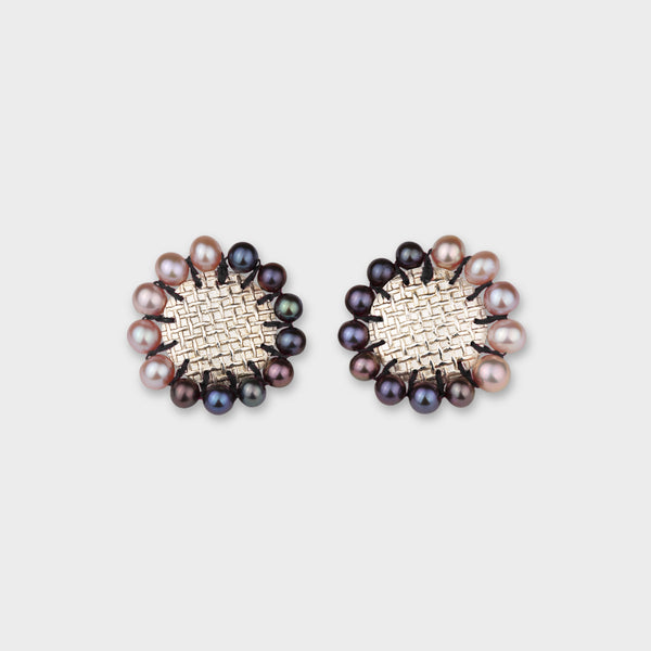 Silver round earrings with pink and peacock pearls all around from the Coco jewellery collection.