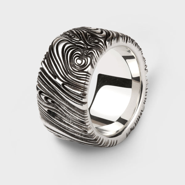 3/4 view of the Into the Woods ring in silver.