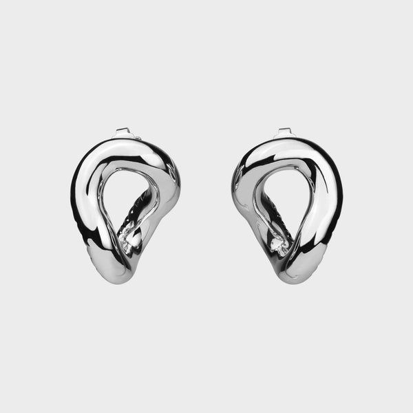 Statement silver earrings from the Raven jewellery collection.