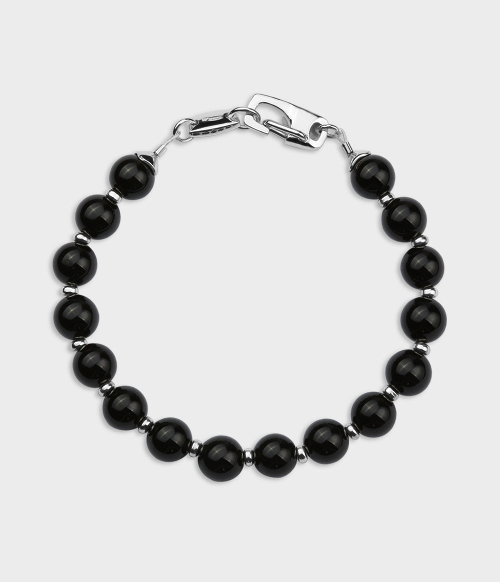 Silver and round onyx stone Trust bracelet.