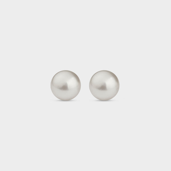 Small white round freshwater pearl and silver studs.