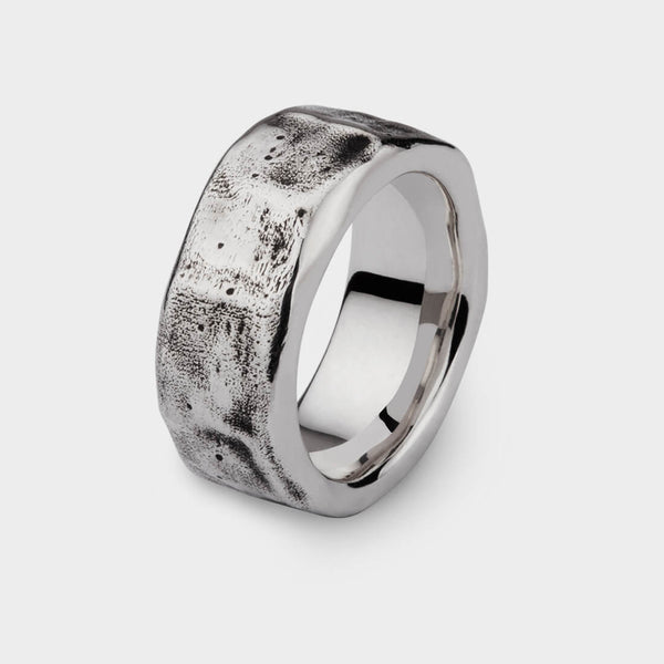 a side profile of our beaten ring in sterling silver.