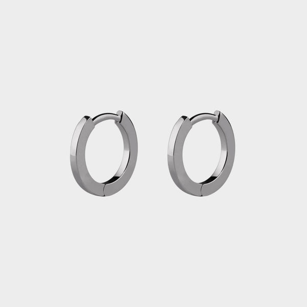 a pair of platinum Extra Small mini Hoop Earrings (Pair) 9Mm O/D