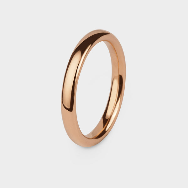 side view of a halo slim wedding ring in rose gold