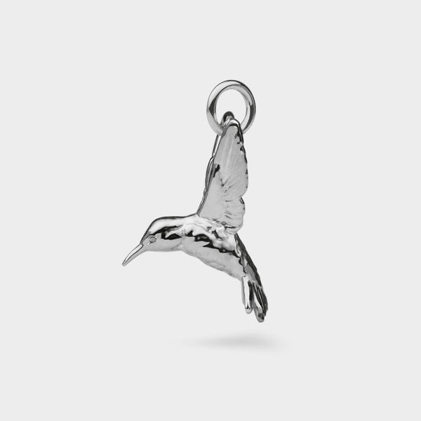 side view of a silver Humming Bird Charm