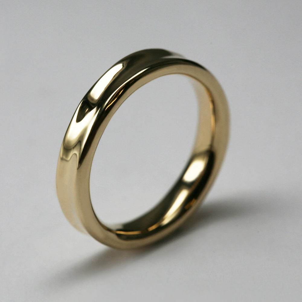 profile of yellow gold fair trade liquid ring.