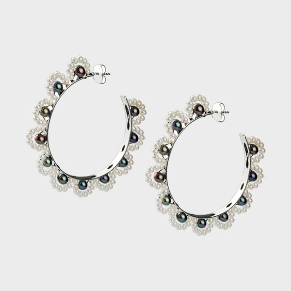 silver hoops with pearl loops threaded on in white and peacock freshwater pearls.