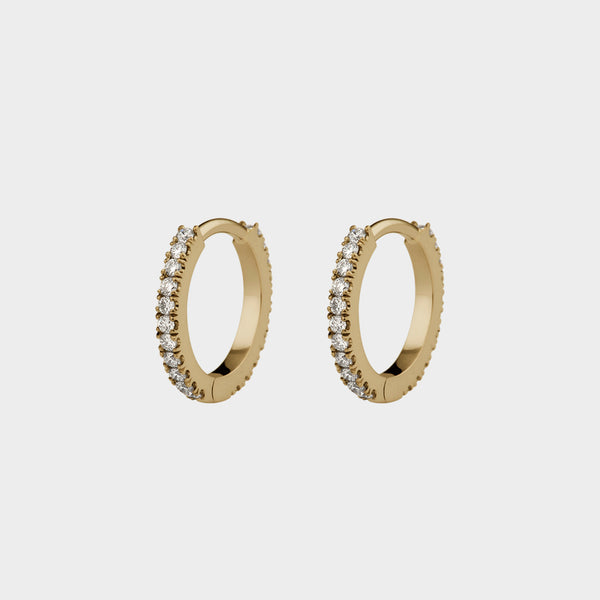 small pavé yellow gold and diamond hoop earrings.