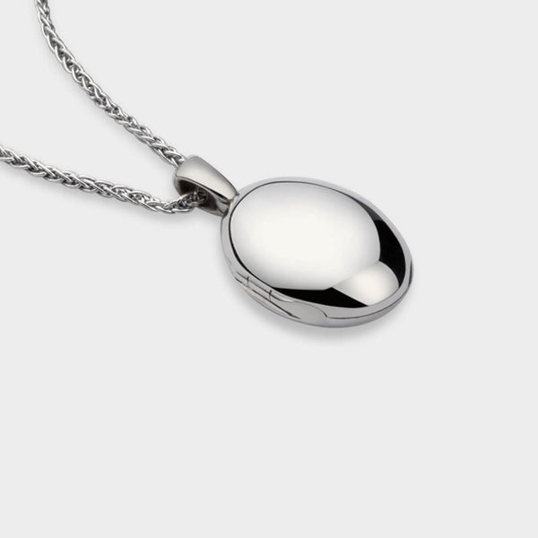 ariel view of a silver Oval Touch Locket