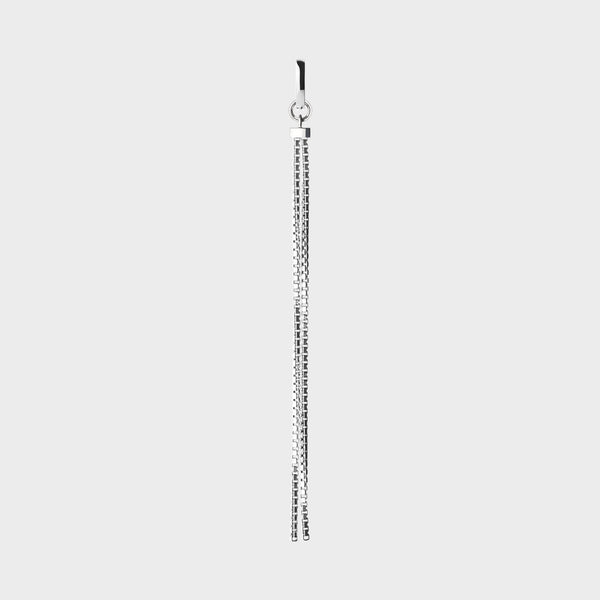 a pretty silver long style earring hanging from a small silver hoop.