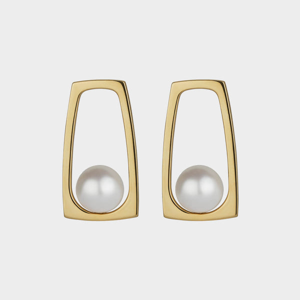 front view of a yellow gold pair of souths sea pearl earrings.