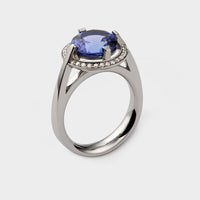 side view of a platinum and blue sapphire Tsarina Diamond Halo Ring
